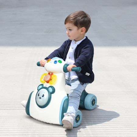 Moto cavalcabile con 4 ruote luci e funzioni sensoriali, Giocattolo musicale cavalcabile e centro attività per bambini, Blu