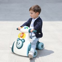 Costway Moto cavalcabile con 4 ruote luci e funzioni sensoriali, Giocattolo musicale cavalcabile e centro attività per bambini, Blu