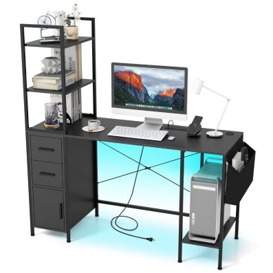 Scrivania da gioco in fibra di carbonio a forma di L, nera, con LED RGB, prese di corrente integrate e libreria regolabile da 140 cm | Leroy Merlin